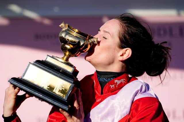 Jockey Rachael Blackmore kisses the Gold Cup as she celebrates after winning the Boodles Cheltenham Gold Cup Chase with A Plus Tard during day four of the Cheltenham Festival at Cheltenham Racecourse.