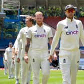 Joe Root and Ben Stokes lead England off the field after defeat to West Indies in Grenada. Picture:  RANDY BROOKS/AFP via Getty Images)