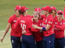 HOWZAT: England's Katherine Brunt, centre, took a wicket with her first ball against Sri Lanka. Picture: PA Wire.