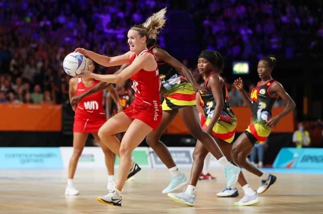 <p>Natalie Metcalf of Team England holds the ball during the Netball Pool B match between Team England and Team Uganda on day five of the Birmingham 2022 Commonwealth Games at NEC Arena on August 02. (Picture: Alex Livesey/Getty Images)</p>