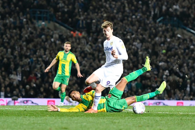 Patrick Bamford gets away from West Brom's Mason Holgate to score his second and Leeds United's third goal.