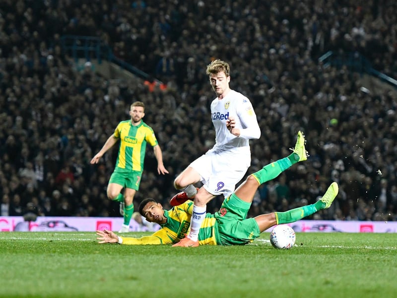Patrick Bamford gets away from West Brom's Mason Holgate to score his second and Leeds United's third goal.