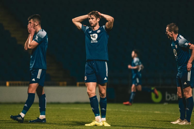 Town defender Neill Byrne, who had an impressive debut season, can't believe it after Wealdstone snatch a late win at The Shay. Photo: Marcus Branston