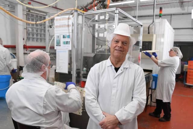 Beech's Fine Chocolates Chairman Andrew Whiting on the shop floor.