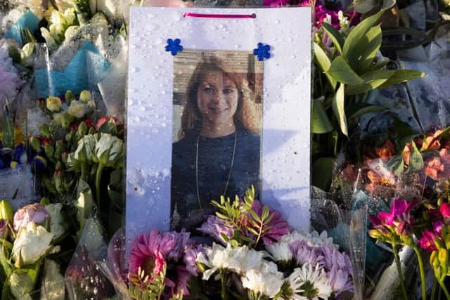 Flowers surround the Clapham Common bandstand memorial to murdered Sarah Everard. (Photo by Dan Kitwood/Getty Images)