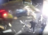 CCTV captured the shocking near-miss outside the busy Hare and Hounds pub in Ormskirk Road, Skelmersdale at around 11pm on Monday, December 27