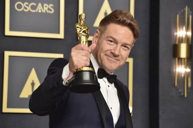 Kenneth Branagh, winner of the award for best original screenplay for "Belfast," poses in the press room at the Oscars on Sunday, March 27, 2022, at the Dolby Theatre in Los Angeles. (Photo by Jordan Strauss/Invision/AP)