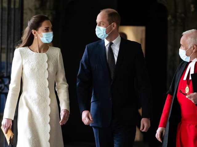 The Duke and Duchess of Cambridge (centre) walk with Dean of Westminster The Very Reverend Dr David Hoyle as they arrive for a visit to the vaccination centre at Westminster Abbey
