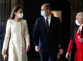 The Duke and Duchess of Cambridge (centre) walk with Dean of Westminster The Very Reverend Dr David Hoyle as they arrive for a visit to the vaccination centre at Westminster Abbey