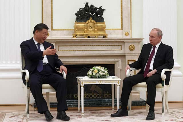 Russian President Vladimir Putin meets with China's President Xi Jinping at the Kremlin in Moscow on Monday. Picture: Sergei Karpuhkin/AFP via Getty Images)