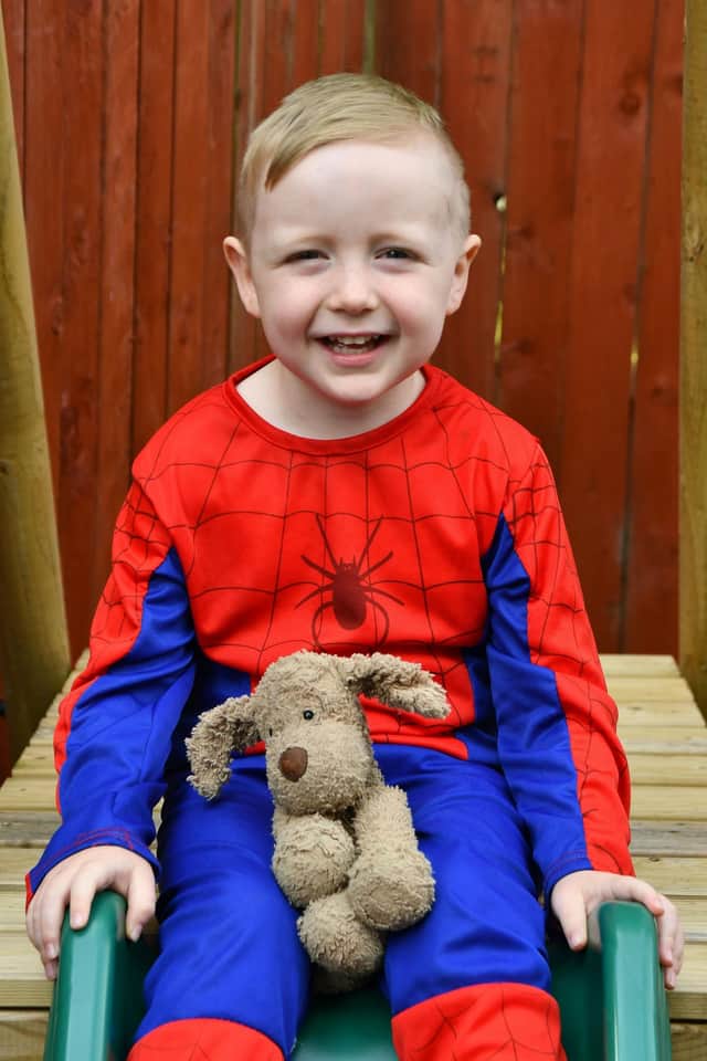 Smiles from Harry Frank, five, who has just completed cancer treatment