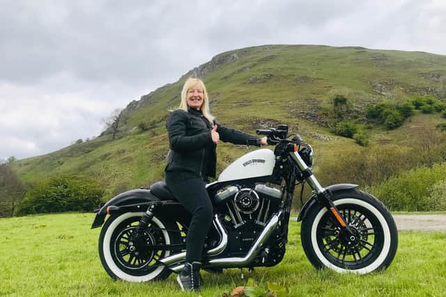 Tina Clifford with her beloved Harley-Davidson 1200 Sportster