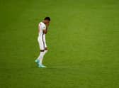 Marcus Rashford reacts after missing England's third penalty in the penalty shoot out during the UEFA Euro 2020 Championship Final against Italy (Photo by John Sibley - Pool/Getty Images)