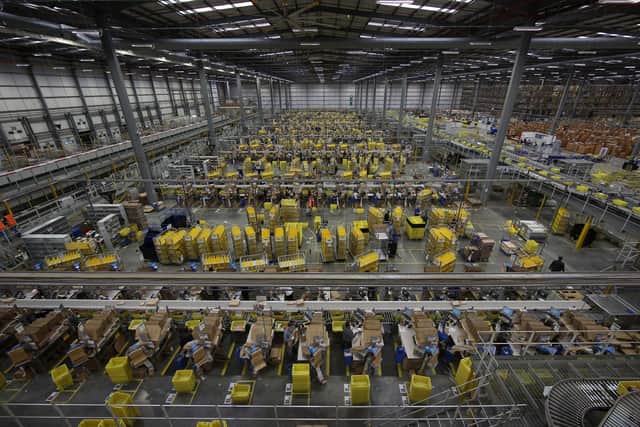 Parcels are prepared for dispatch at Amazon's warehouse in Hemel Hempstead (Peter Macdiarmid/Getty)