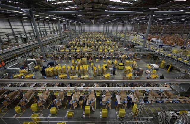 Parcels are prepared for dispatch at Amazon's warehouse in Hemel Hempstead (Peter Macdiarmid/Getty)
