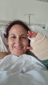 A holidaymaker's dream trip to Sardinia turned to horror when she had an epileptic seizure in a hot shower - suffering such severe burns she couldn't walk for 18 MONTHS.