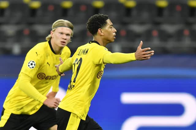 Borussia Dortmund's Jude Bellingham celebrates scoring their side's first goal of the game during the UEFA Champions League, quarter final, second leg match against Man City.
