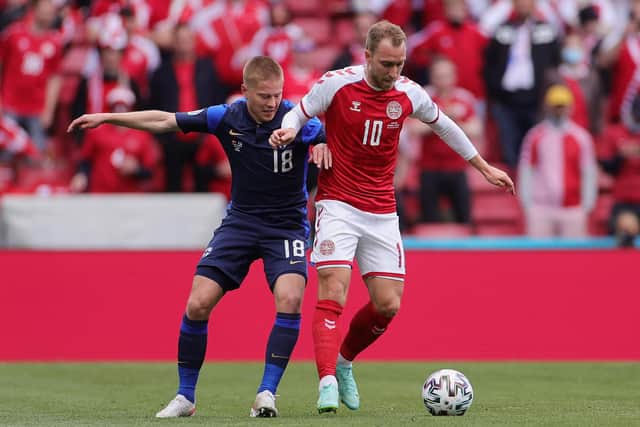 Christian Eriksen of Denmark (red shirt) in action against Finland at Euro 2020 before he later collapsed on the pitch. (Pic: Getty Images)