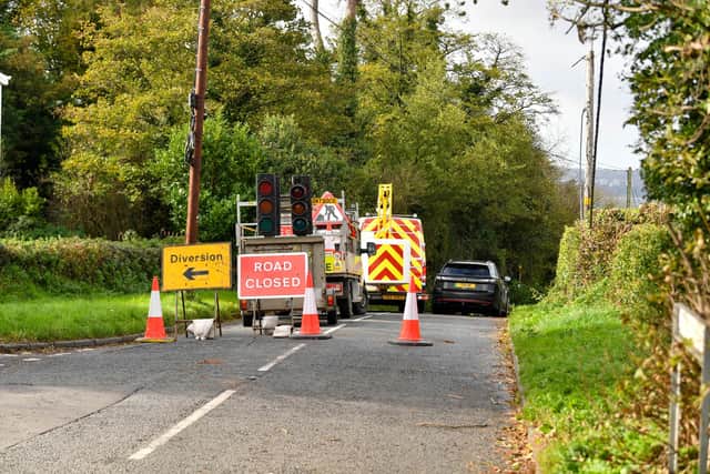 This was the scene in Holywood where Engineers work to remove a tree fallen on Whinney Hill.
