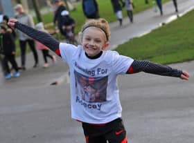 Jordan Banks, 9, died after being struck by lightning on May 11. Here he is pictured running a marathon in Stanley Park to raise money for a mental health charity.