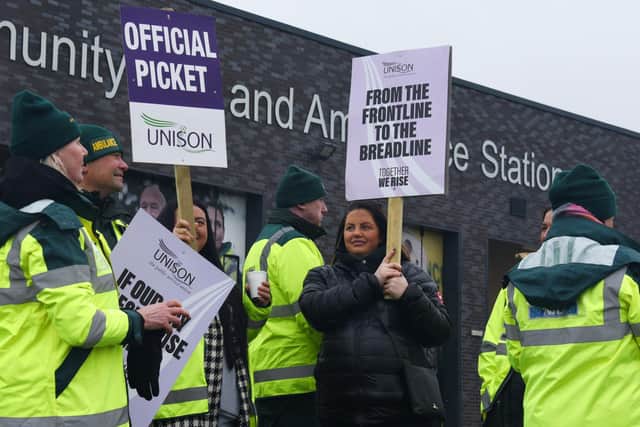 The picket line outside Wigan Community Fire and Ambulance Station in Robin Park Road, Wigan
