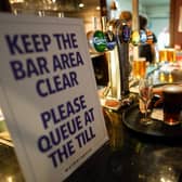 A two-week delay to the planned easing of restrictions in England on June 21 is reportedly being considered - meaning social distancing in pubs will still be needed (Getty).