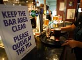 A two-week delay to the planned easing of restrictions in England on June 21 is reportedly being considered - meaning social distancing in pubs will still be needed (Getty).