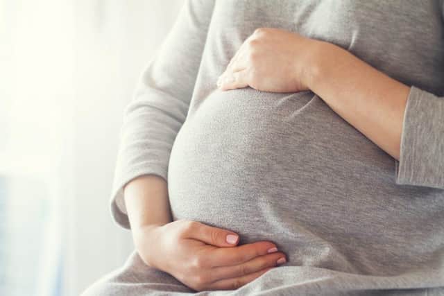 The pregnant teenager might be refused entry to her end of year prom (Shutterstock)