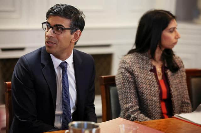 Rishi Sunak and Suella Braverman pictured in March announcing the Illegal Migration Bill. 
Credit: Phil Noble - Pool/Getty Images