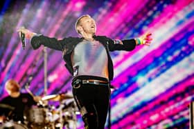 BUENOS AIRES, ARGENTINA - OCTOBER 25: Chris Martin of Coldplay performs during the first of ten shows as part of 'Music Of The Spheres World Tour' at Estadio Mas Monumental Antonio Vespucio Liberti on October 25, 2022 in Buenos Aires, Argentina. (Photo by Santiago Bluguermann/Getty Images). The concert is set to be screened at Belfast's Cineworld in a uniquely immersive way