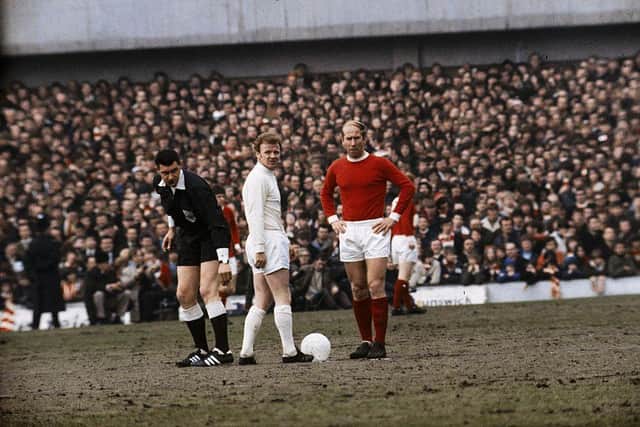 Billy Bremner of Leeds United and Bobby Charlton of Manchester United face off in 1970.