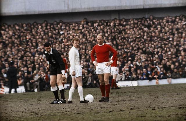 Billy Bremner of Leeds United and Bobby Charlton of Manchester United face off in 1970.