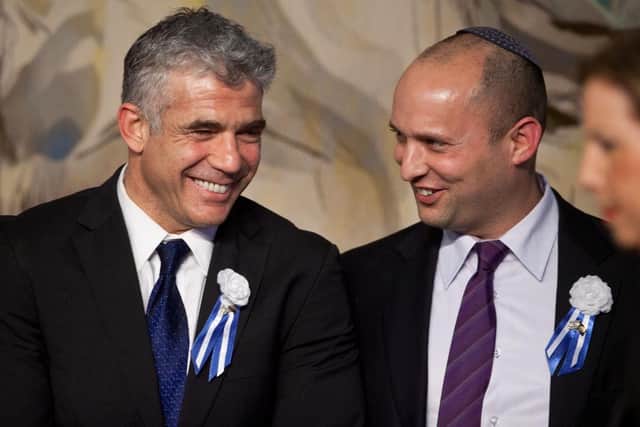 Yair Lapid (L), leader of the Yesh Atid party and Naftali Bennett have formed a coalition (Getty Images)