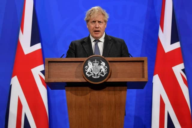 Boris Johnson announcement: What did PM say about 21 June restrictions - and when will Covid rules change? (Photo by Toby Melville - WPA Pool / Getty Images)