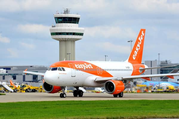 An easyJet plan ready to take off at Gatwick Airport. Picture: Steve Robards/SussexWorld