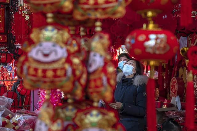 Chinese New Year falls on Tuesday, February 1 this year and supermarkets including Tesco, Sainsbury's, Morrisons and Asda have plenty of meal deals to help people celebrate the advent of the Year of the Tiger (Photo by Kevin Frayer/Getty Images)