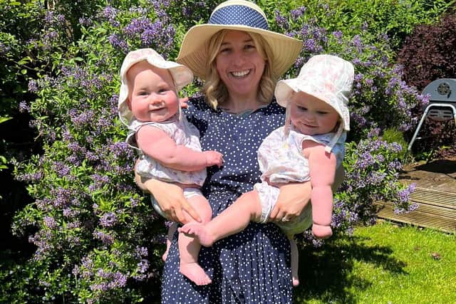 These cheeky toddler twins have been filmed outwitting their NHS scientist mum to avoid ending playtime - by running away every time she carries the other inside.