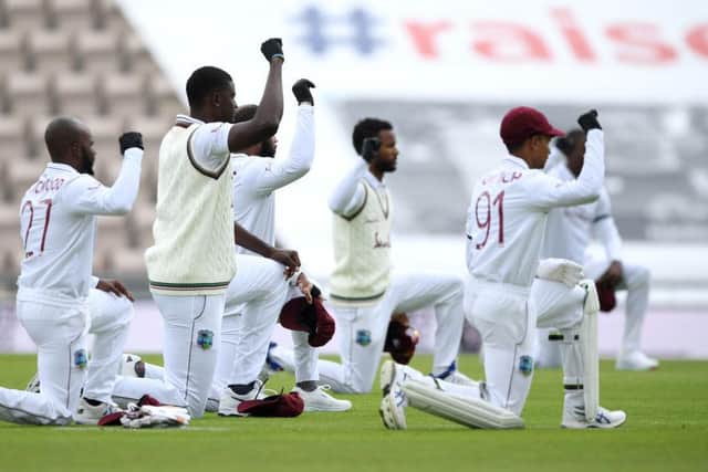 West Indies captain Jason Holder and his teammates take a knee during day one of the first Test match at The Ageas Bowl.