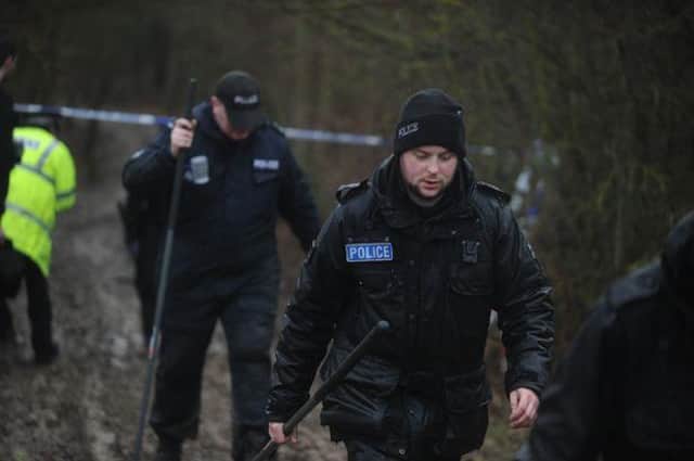 Police searched the woods for evidence, but the murder weapon was never recovered (Image: Keith Jones)