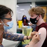 Those aged 25 to 29 who have not yet received a Covid vaccine will be invited to book an appointment (Getty Images)
