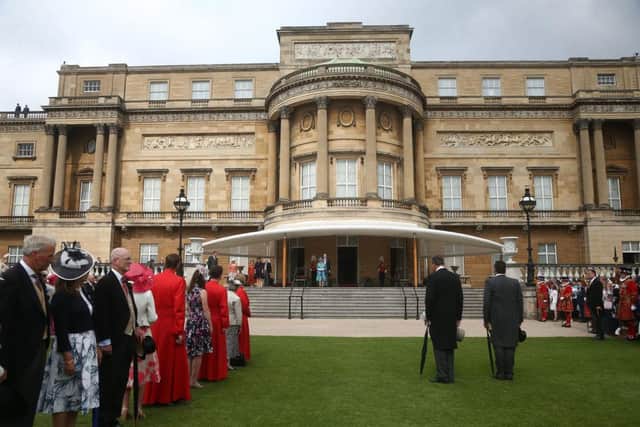 Guests waiting for Queen Elizabeth II as while attending a Garden Party at Buckingham Palace in 2018 (Photo: Yui Mok - WPA Pool/Getty Images)