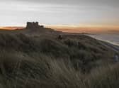 The sun sets behind Bamburgh Castle (Photo: Dan Kitwood/Getty Images)