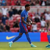 Marcus Rashford of England celebrates after scoring from the penalty spot.