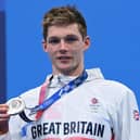 Silver medallist Britain's Duncan Scott poses with his medal after the final of the men's 200m individual medley swimming (Jonathan Nackstrand/AFP/Getty)
