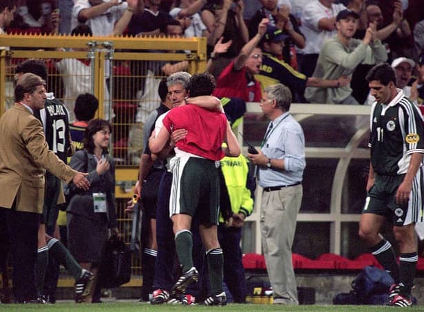 England coach Kevin Keegan consoles the German players after the European Championships 2000 group match at the Stade Communal in Charleroi, Belgium.