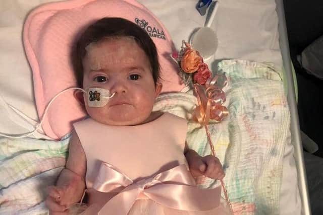 Baby Layla was a bridesmaid for her parents as they got married in hospital to be by her side (SWNS)