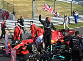 Race winner Lewis Hamilton of Great Britain and Mercedes GP celebrates in parc ferme during the F1 Grand Prix of Great Britain at Silverstone on July 18, 2021 in Northampton, England. (Photo by Michael Regan/Getty Images)