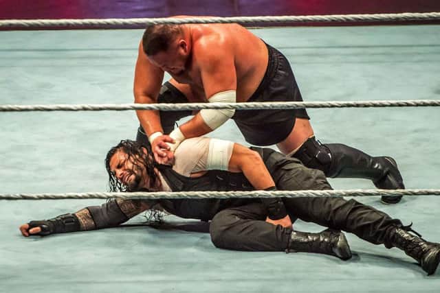 Samoa Joe (top) is arguably the highest-profile release of the bunch, and fans will be hoping the veteran wrestler is snapped up by a rival promotion, like AEW (Photo: PHILIPPE HUGUEN/AFP via Getty Images)