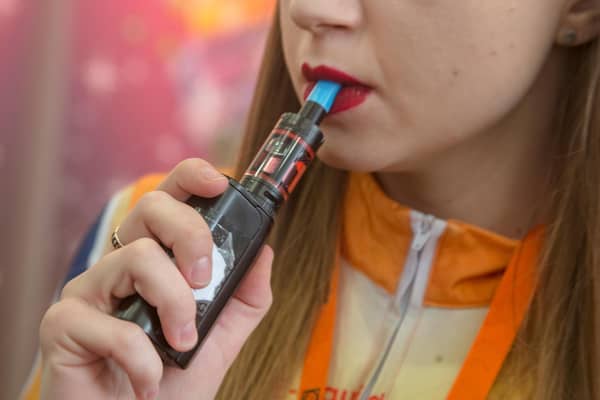 A teenager pictured vaping. (Picture: Alamy/PA)