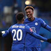 Tammy Abraham of Chelsea celebrates with team mate Callum Hudson-Odoi. (Photo by Catherine Ivill/Getty Images)
